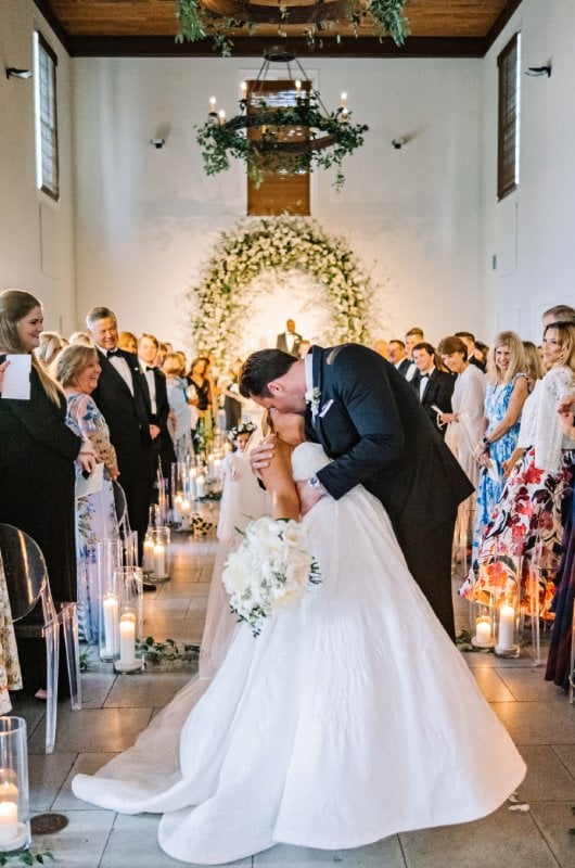 Mary Margaret and Michaels Wedding in Florida Kiss in Aisle