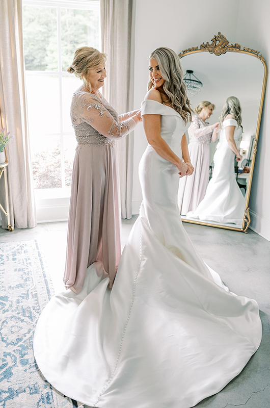 Kendall and Blake Marry in a Whimsical Ceremony at White Fox Cottage Bride Getting Ready with her Mom