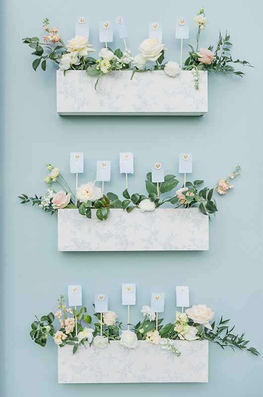 a_blooming_blue_spring_wedding_in_augusta_ga_couple_escort_card_display