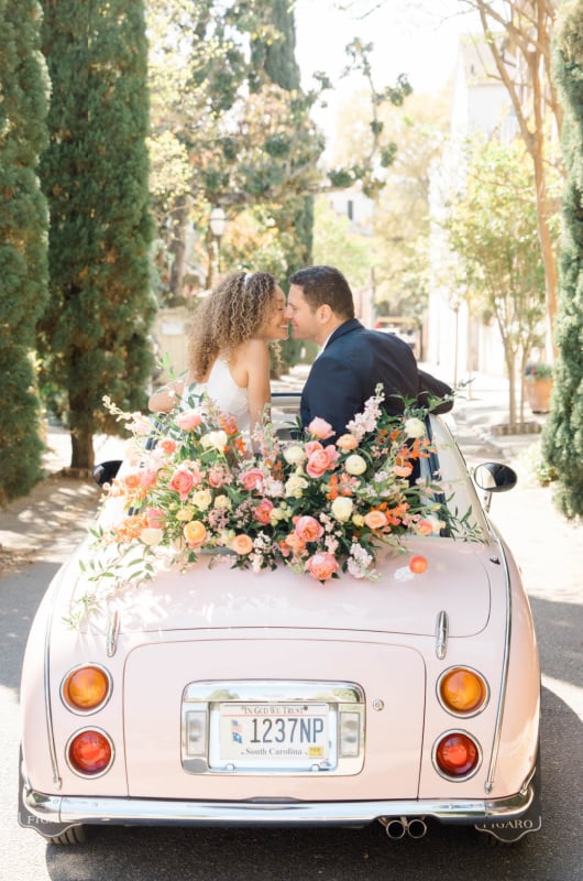 Romance In Charleston couple car