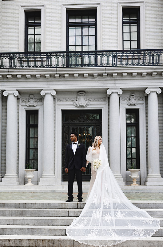 Heather Jenkins Photography couple in front of columns