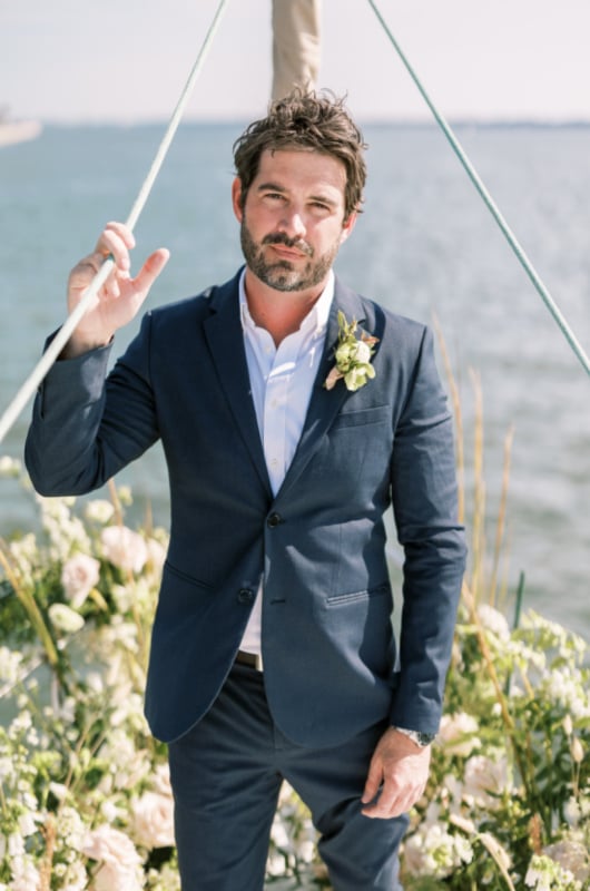 Sail Away With Me Charleston South Carolina groom on boat