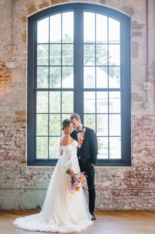 Styled Shoots By Southern Bride Charleston Cedar Room couple by the window