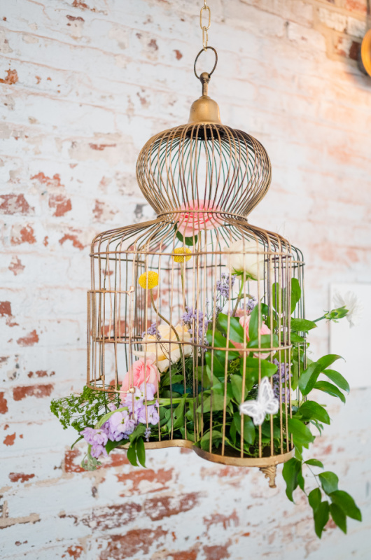 Styled Shoots By Southern Bride Charleston Cedar Room flowers in a cage