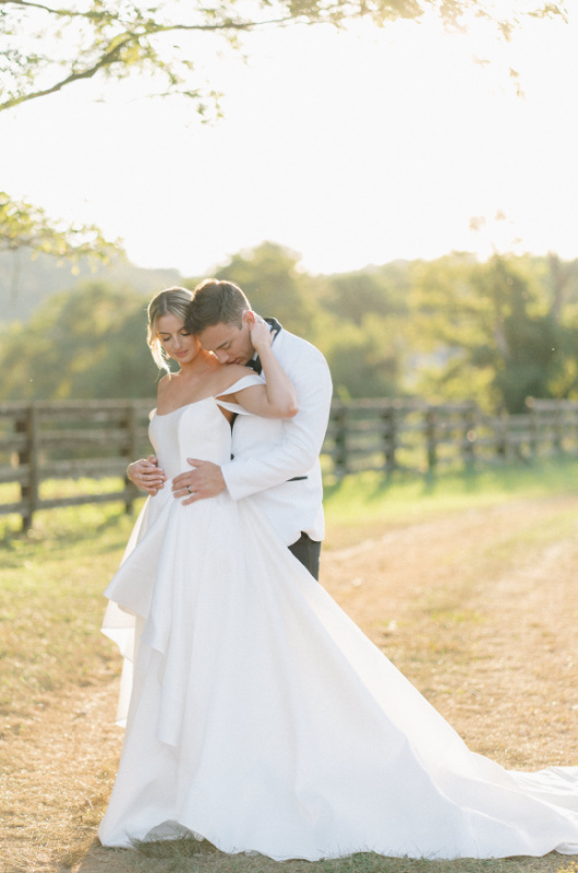 Ralph Lauren Inspired Autumnal Editorial Nestled In The Hills of Northern Kentucky bride and groom hug