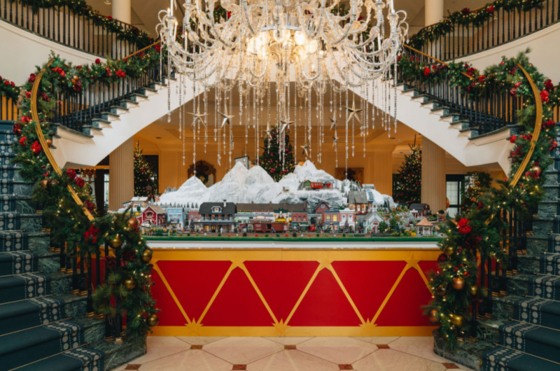 Pop the question under snowfall this holiday season in Charleston hotel interior
