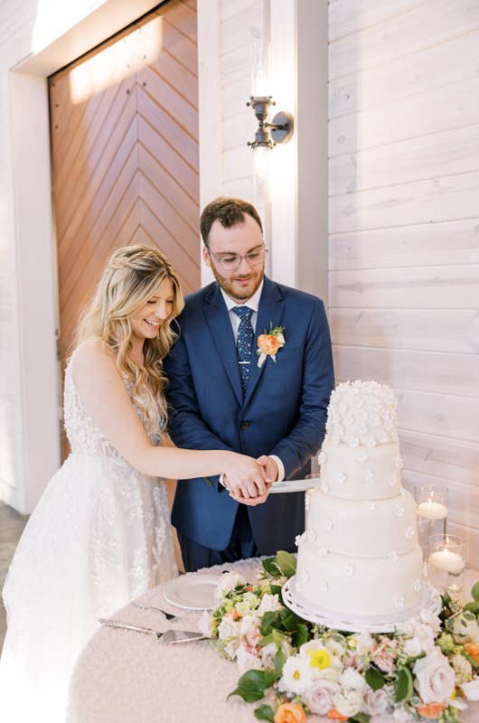 Abigail Magdzairz And Jason Best cake cutting together