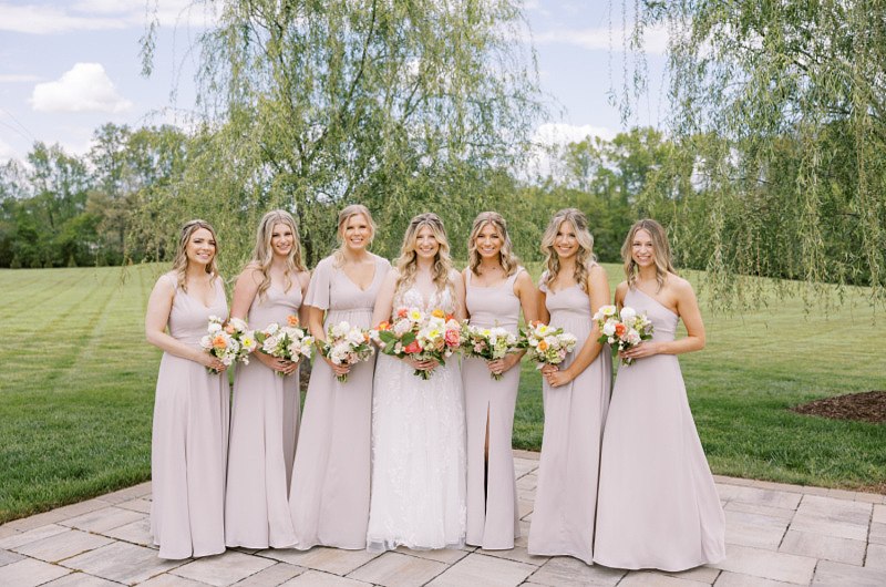 Abigail Magdziarz And Jason Best with bridesmaids