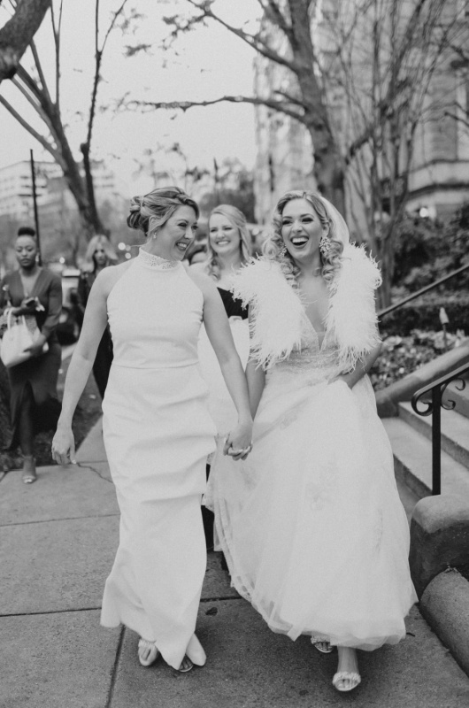 Sutton Roach And Jill Tyson Marry In Washington DC walking down the street