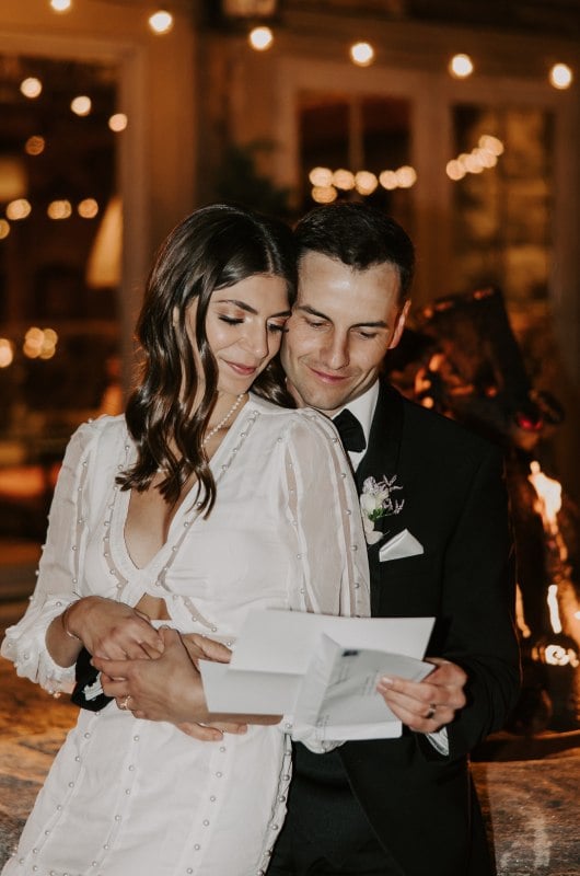 Kaitlyn Shaker And Jason Bete reading letters