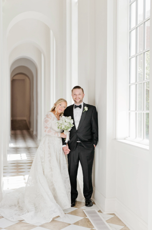 Mary Katherine Harris and James Rose Real Weddings bride and groom by window