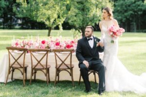 Pink Extravaganza Hendersonville North Carolina couple at the table standing