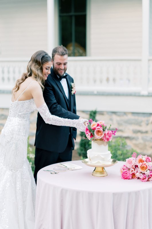 Pink Extravaganza Hendersonville North Carolina cutting the cake