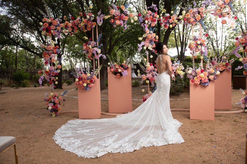 Ultimate Guide To Wedding Venue bride and flowers