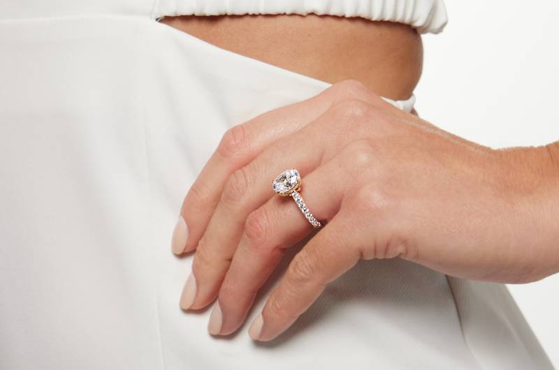 With Clarity Choosing the Perfect Diamond for Your Engagement Ring Hand on Waist