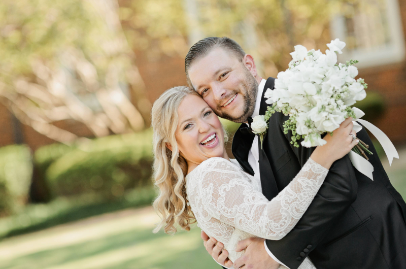 mary and james rose real weddings bride and groom smiling in garden