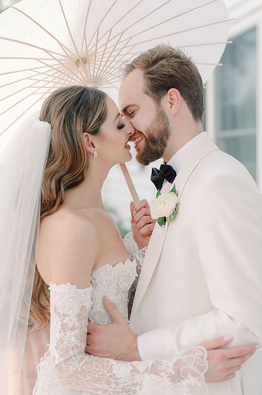 Marissa Newberger And Cole Nowlin umbrella kiss