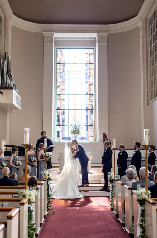 Courtney Young And John Couvillion ceremony kiss