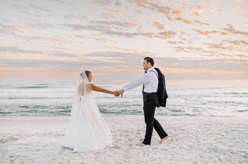 Mary Margaret and Michaels Wedding in Florida Holding Hands