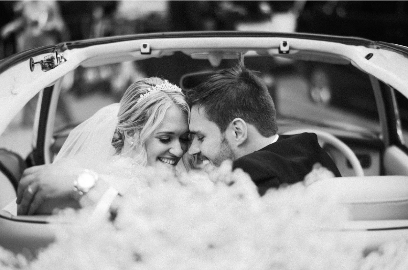 giselle palladino and jamie huzu real wedding black and white car