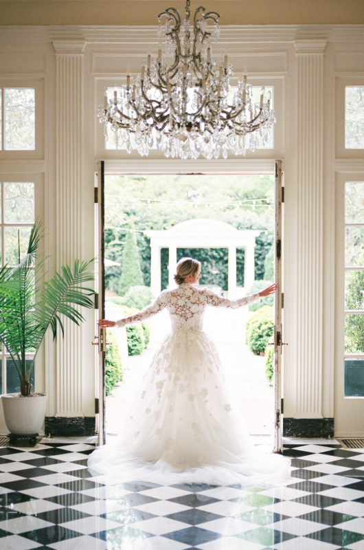 giselle palladino and jamie huzu real wedding bride in doorway