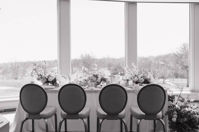 Coastal Meets Midwestern Elegance table by the windown bw