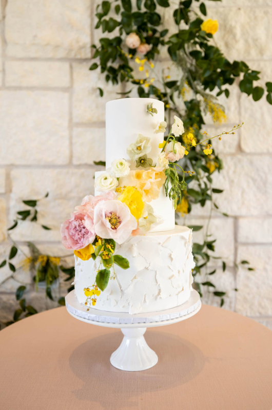 austin styled shoot country hill three tier cake with yellow flowers