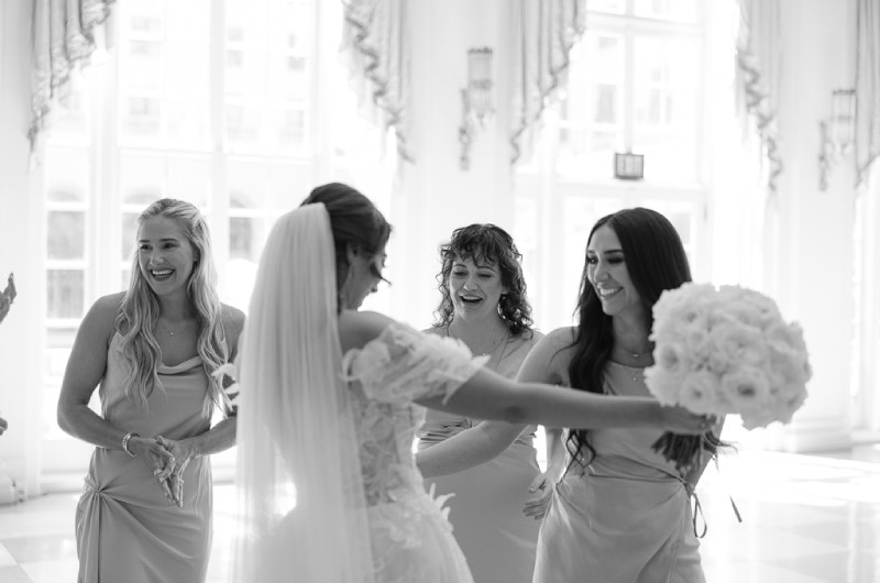 Megan Nager And Corey Turner bride and bridesmaids first look