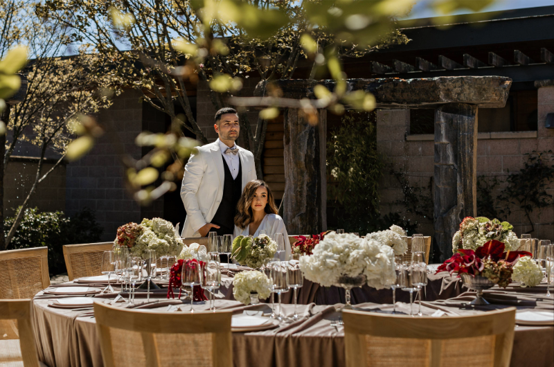 bardessono styled shoot couple sitting at table