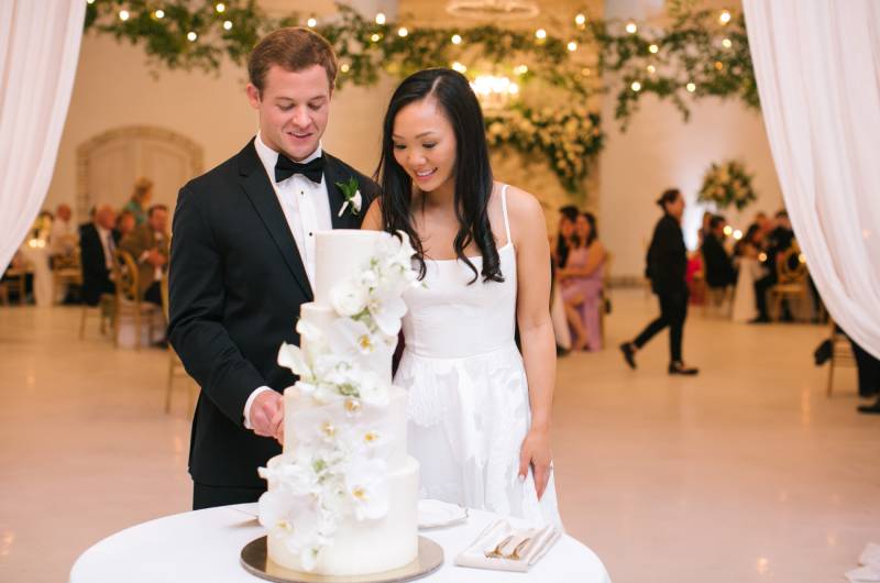 Emily Chan Austin Michels Cutting Cake