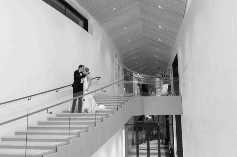Laura Bonds Scott Melton Stair Kiss