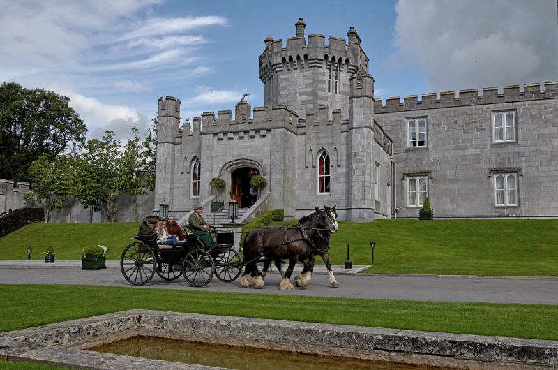 Fairytale Weddings Say I Do To Old World Charm at the Dromoland Castle Co Clare Ireland carriage in front of castle