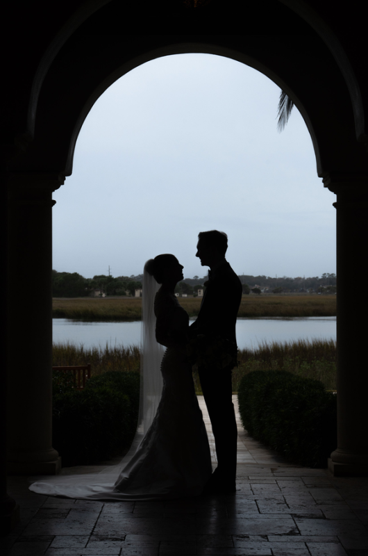 Julia Van de Bogart and John Rand Dorney real wedding couple archway