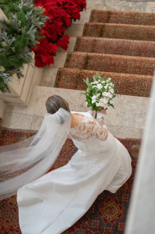 Julia and Rand Dorsey bride walking down the stairs