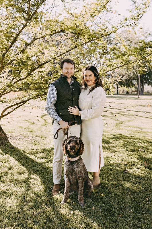 Maggie Russell and Paul LaHue couple with dog Maggie Russell and Paul LaHue couple with dog