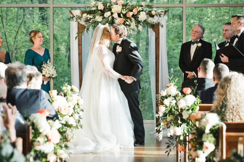 Donna Cooper and Thomas DeNomi kiss
