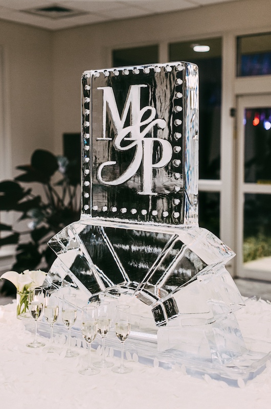 Maggie Russell and Paul LaHue arch Maggie and Paul Ice