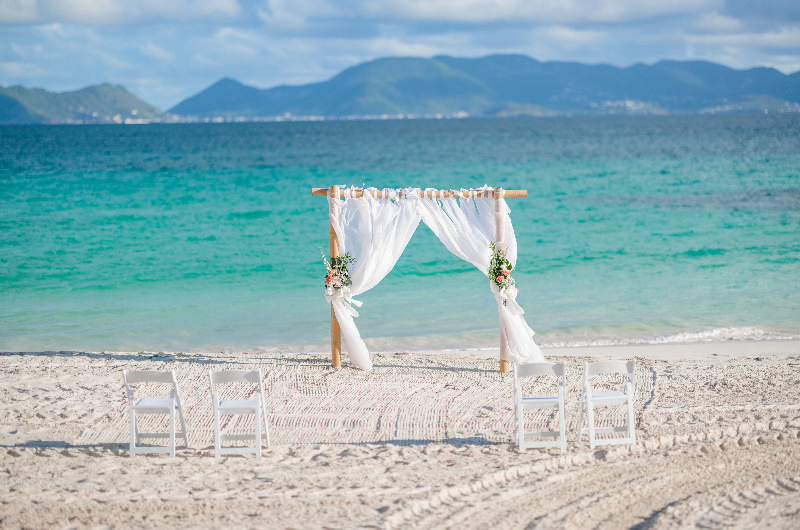 Carribbean Paradise Aurora Anguilla Resort and Golf Club beach arch