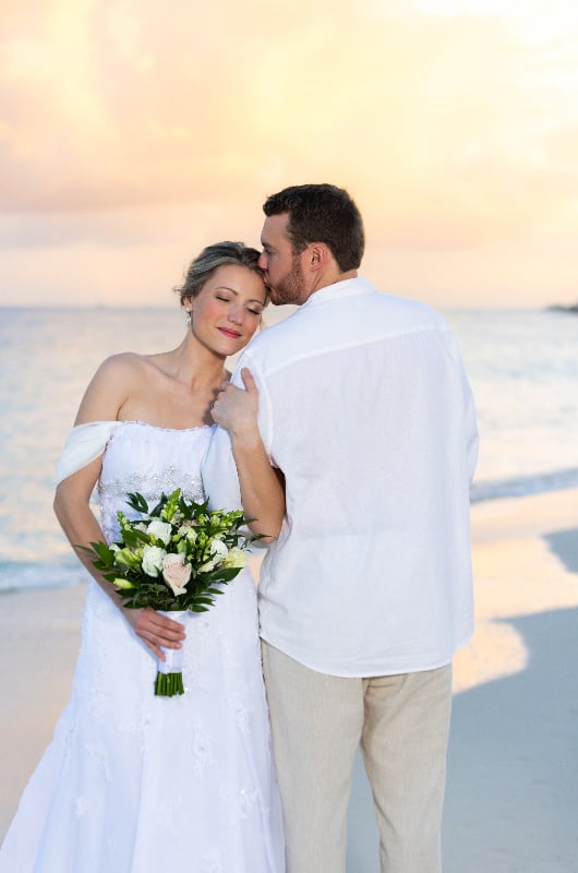 Evot carribbean-paradise-aurora-anguilla-resort-and-golf-club-couple-on-the-beach