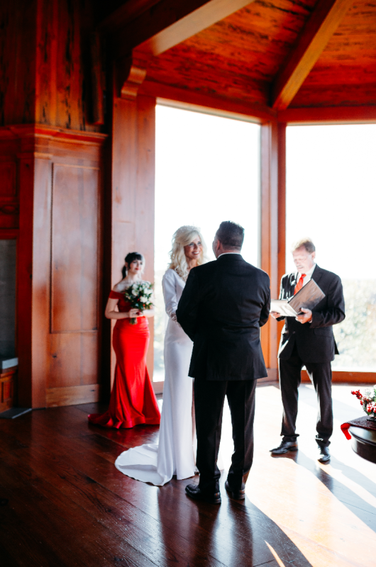 Sheila Basel & Wayne Wright real wedding bride at altar staring at groom Sheila Basel & Wayne Wright real wedding bride at altar staring at groom