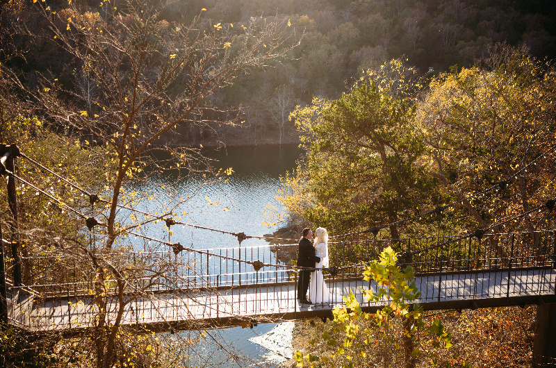 Sheila Basel & Wayne Wright real wedding bridge kiss
