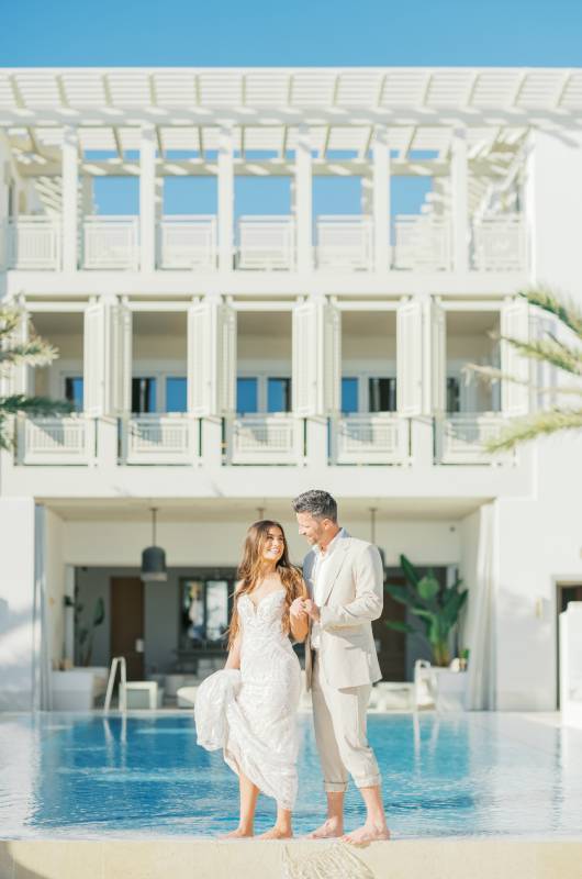 seaside sophistication a luxury elopement at kaiya beach resort inlet beach fl walkin on water easide sophistication a luxury elopement at kaiya beach resort inlet beach fl couple at pool