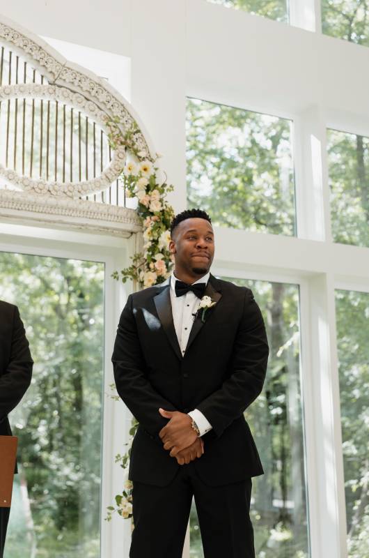 Shilee Hesman Antonio Sanders groom at altar