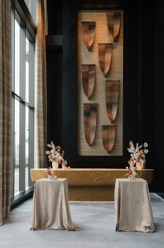 Stunning & Brilliant Events Named Trendsetter in Chicago couple at reception gold bar