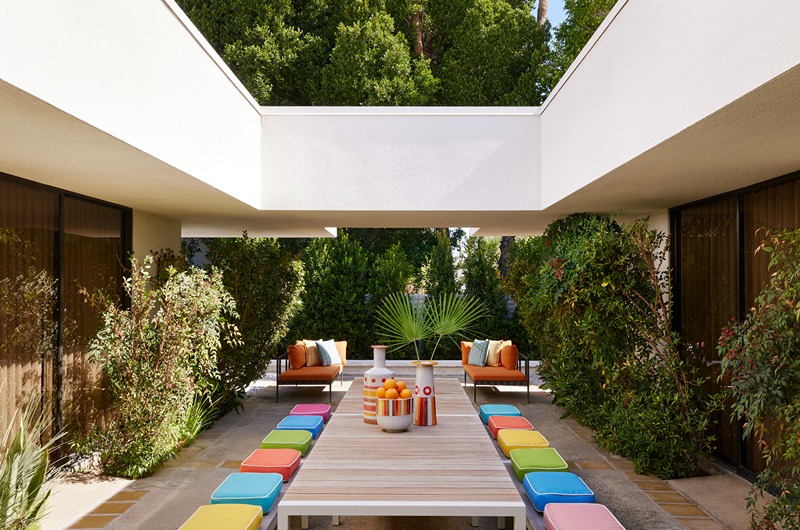 Top Places to Travel January 2026 parker table honeymoon-roundup-6-luxury-romantic-honeymoon-destinations-colorful-benches