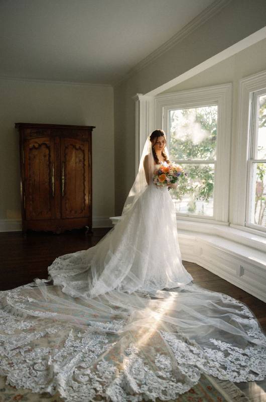 southern garden wedding inspiration at magnolia manor new bern nc styled shoot bride by the window