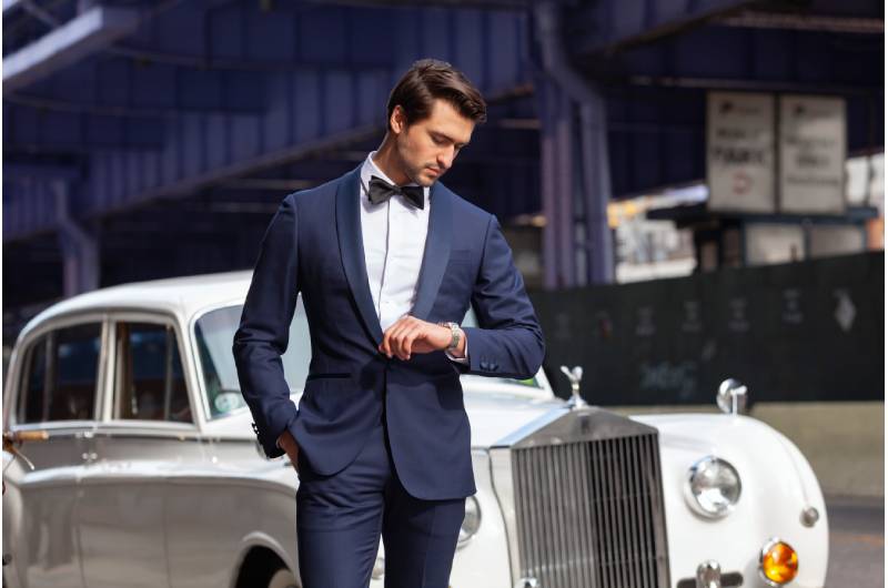 Groom Outfit Change Q&A With Menswear Expert Brad Bradley navy suit car