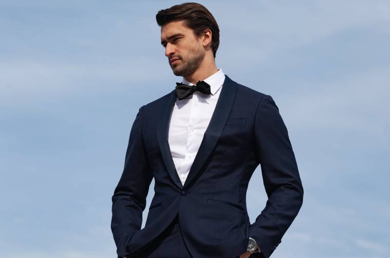 Groom Outfit Change Q&A With Menswear Expert Brad Bradley navy suit sky