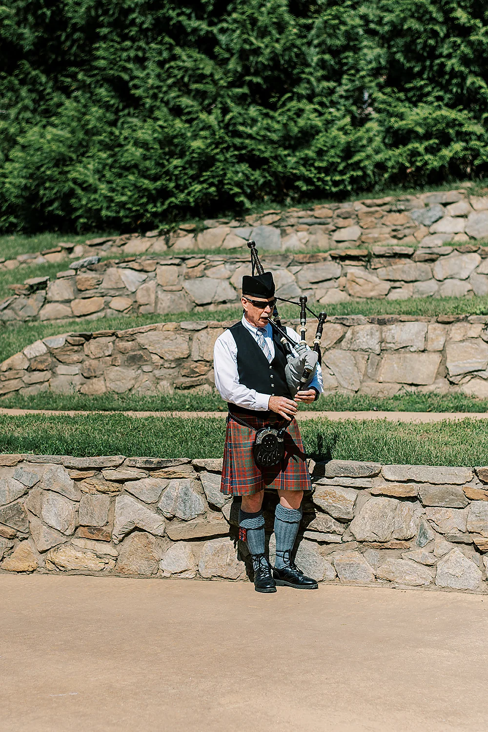 Christina Collins And Brian Gardner bagpiper in kilt playing North Carolina Meghan Rose Photography