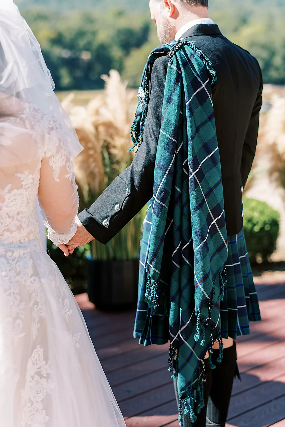 Christina Collins And Brian Gardner bride groom holding hands North Carolina Meghan Rose Photography